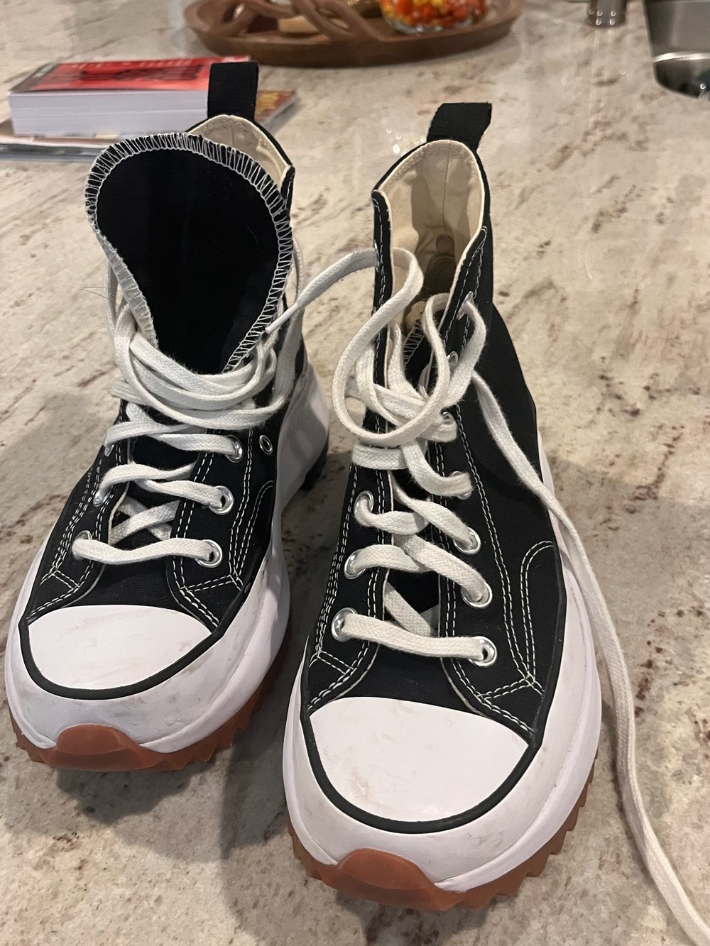 Black High-Top Converse Sneakers with White Laces